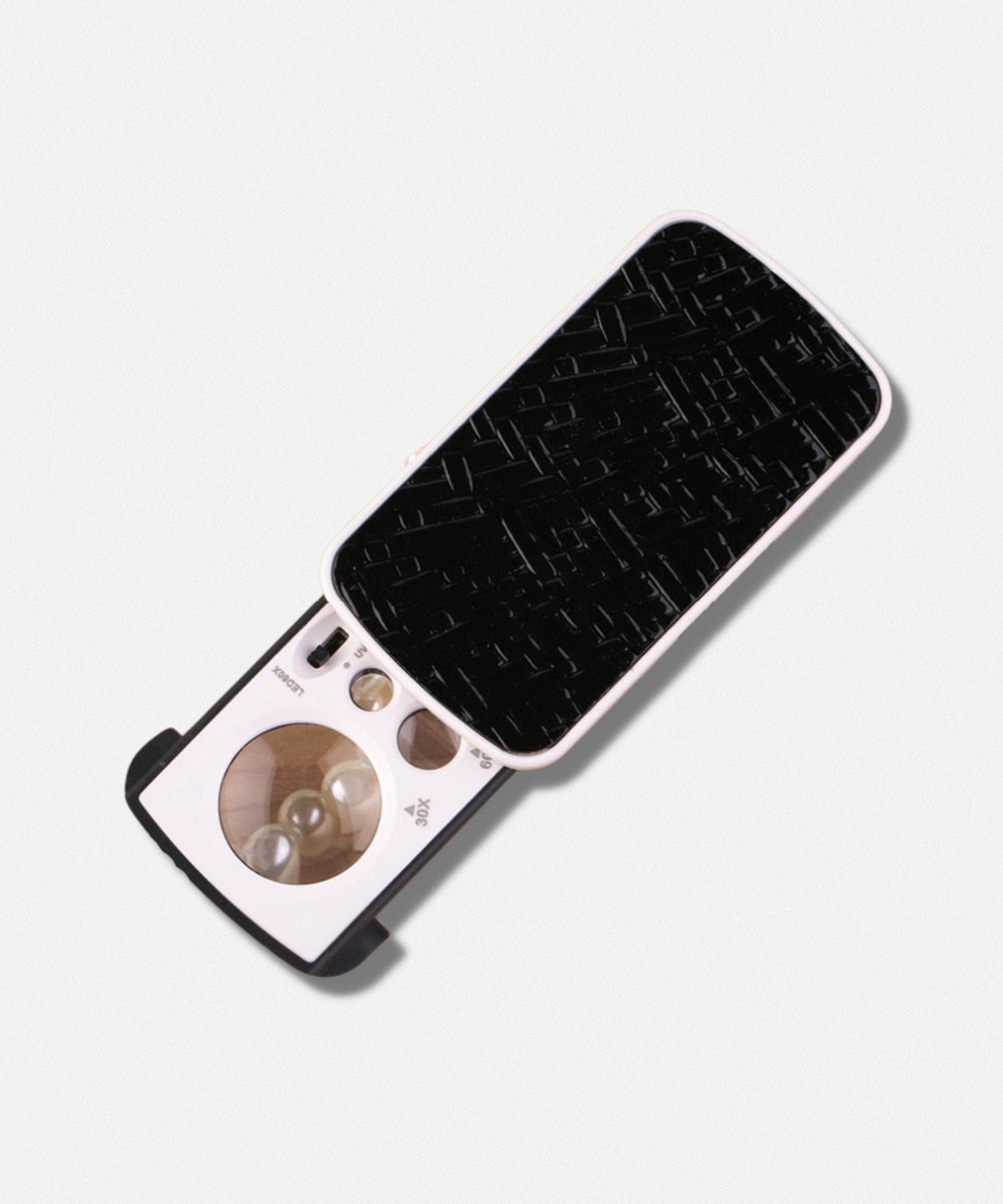 Loupe à main éclairante